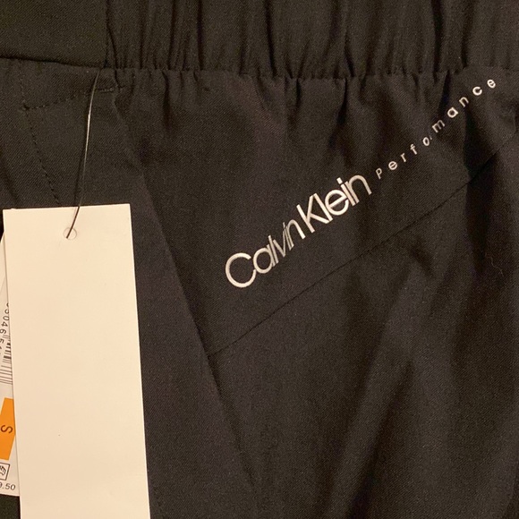 Calvin Klein Performance Front Pleat Tapered Pants with Pockets - Picture 4 of 4